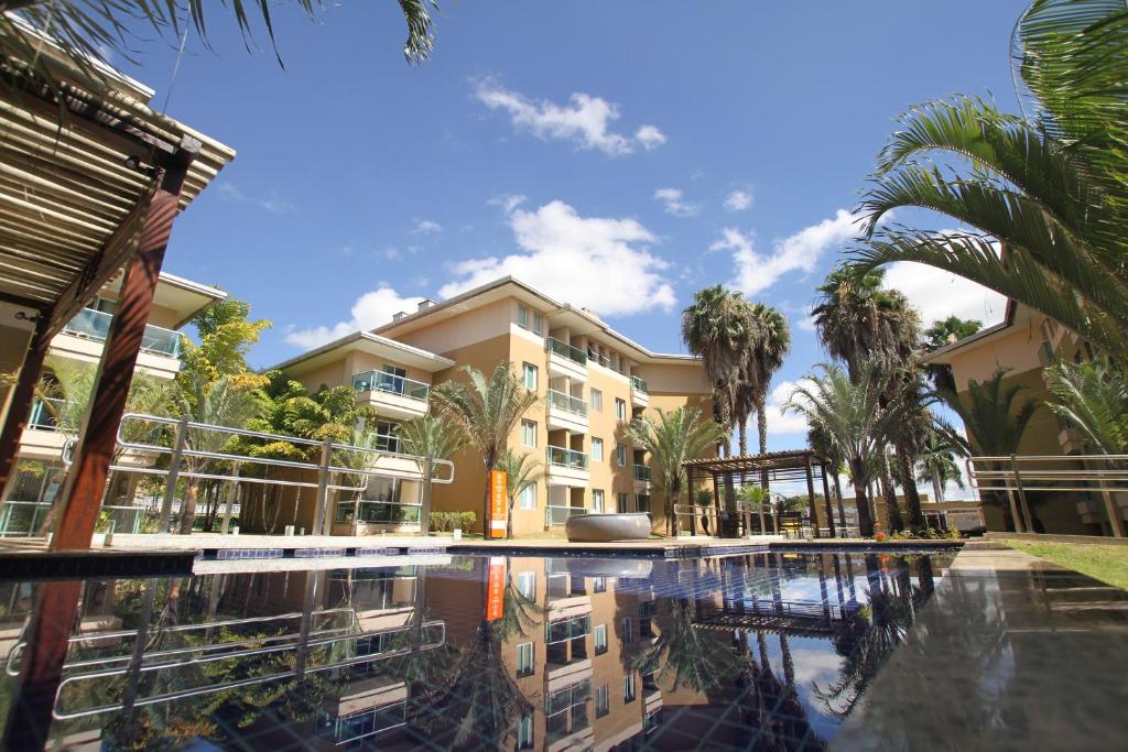 The Sun Full Condominium pool and gardens